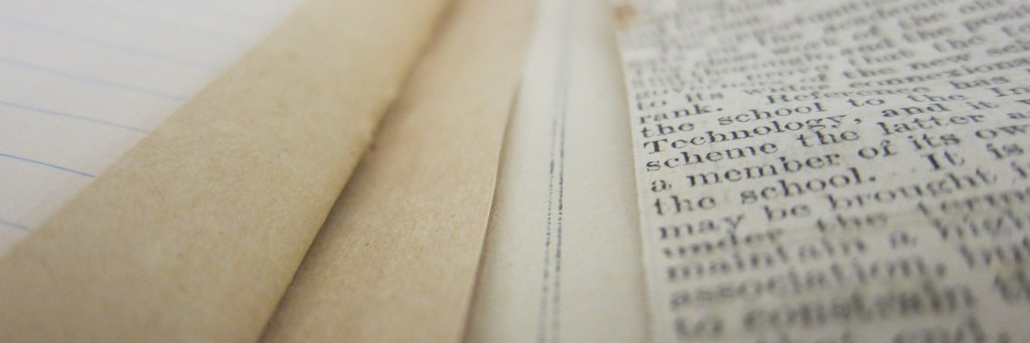 Close up of pages from scrapbook in Archive collection showing the texture of the paper and print